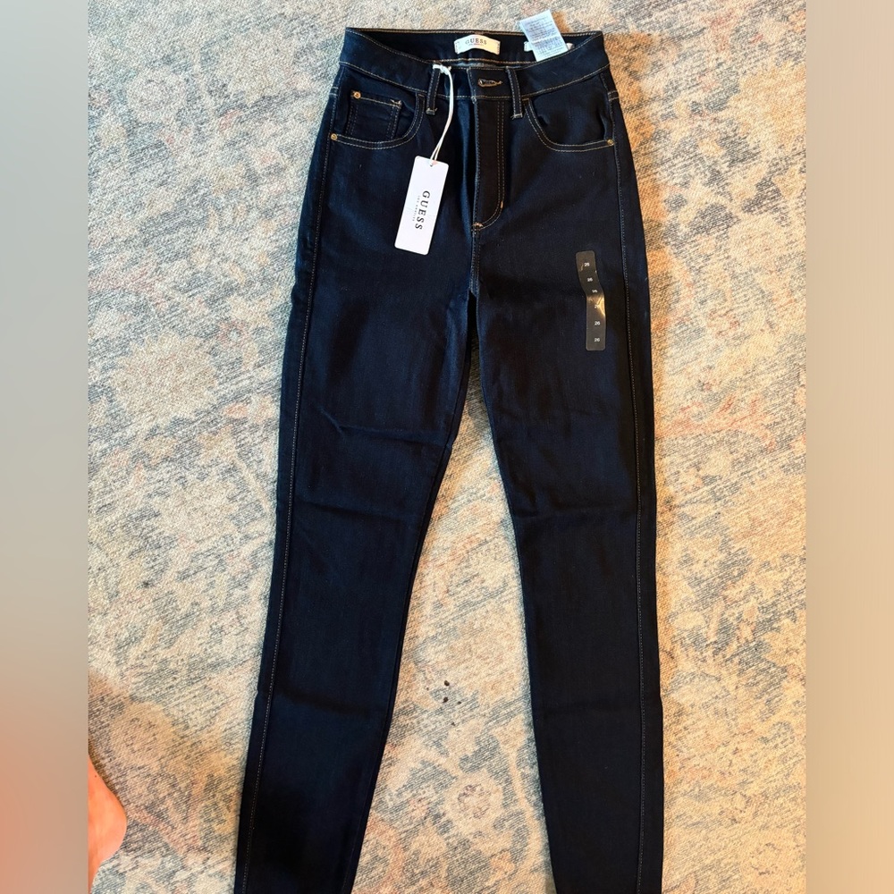 Dark blue Guess Jeans, never worn with tags. Size 26 super high rise.